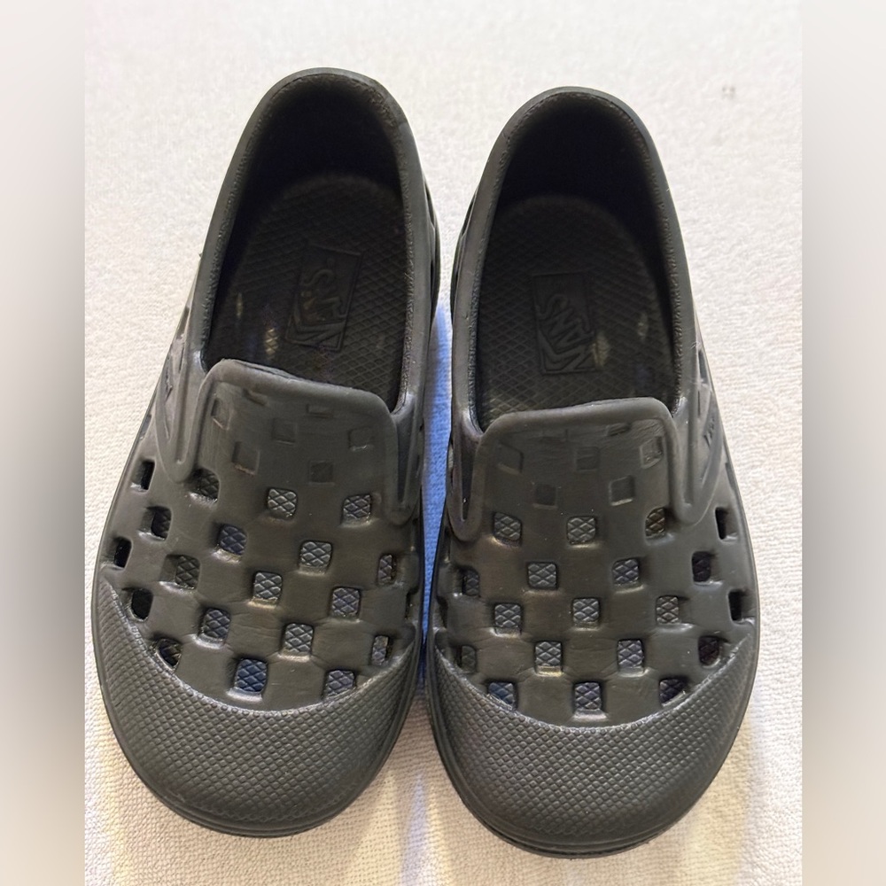 Vans toddler slip on Black. Waterproof. Size 6 toddler great for boy or girls.